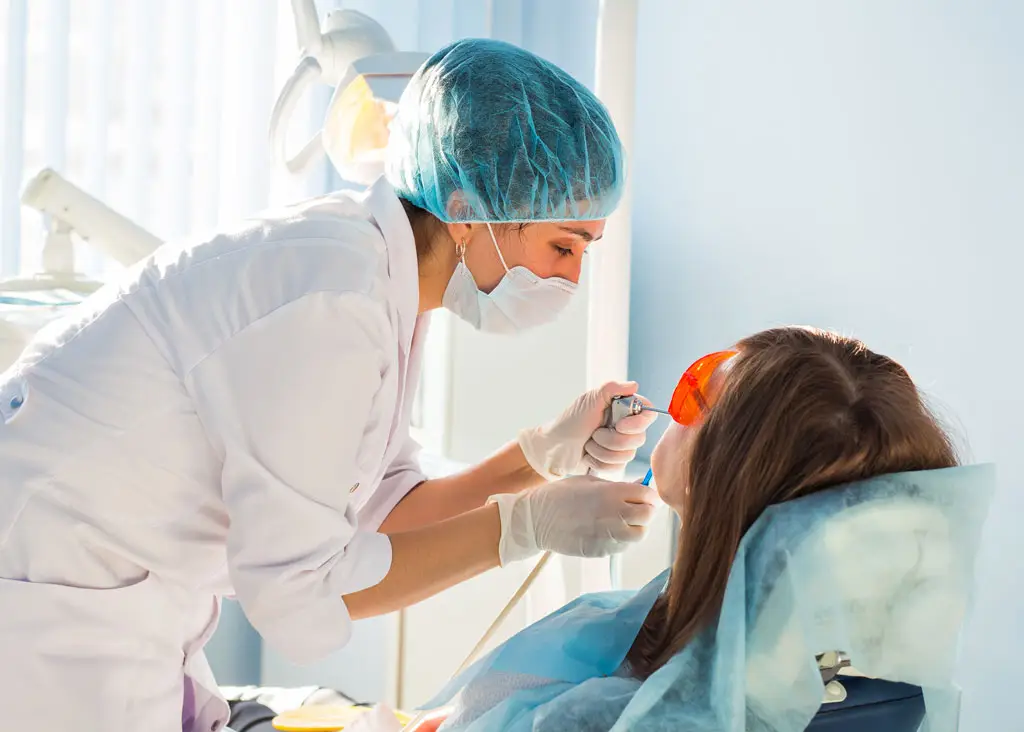 young-woman-getting-dental-treatment-dental-clinic-PXA9645.jpg
